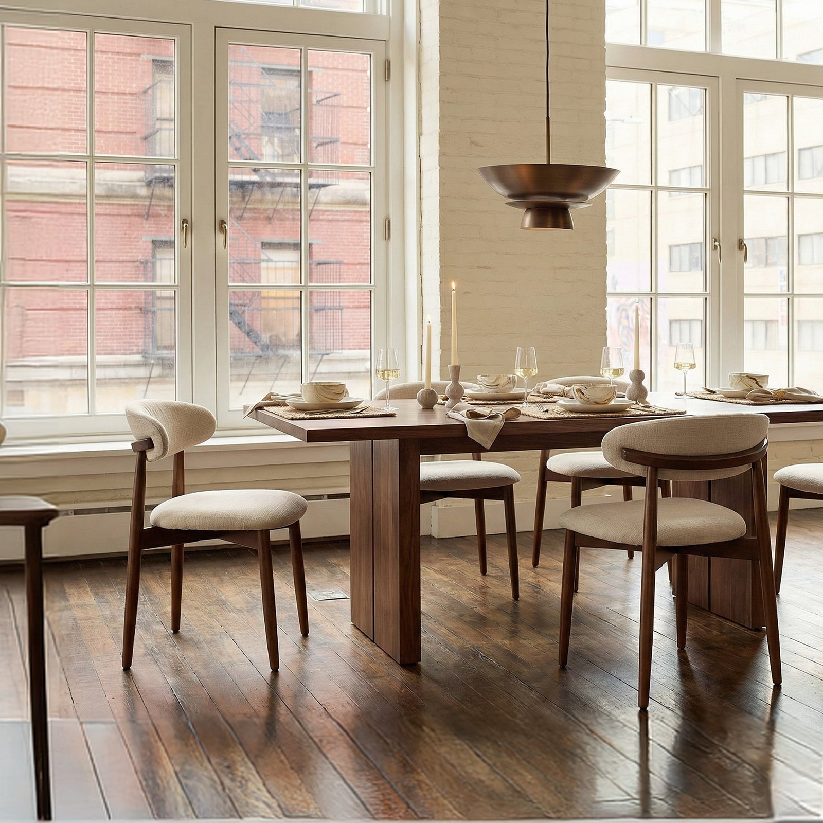 COLAMY mid century modern upholstered dining chairs around a wooden dining table in a bright dining room