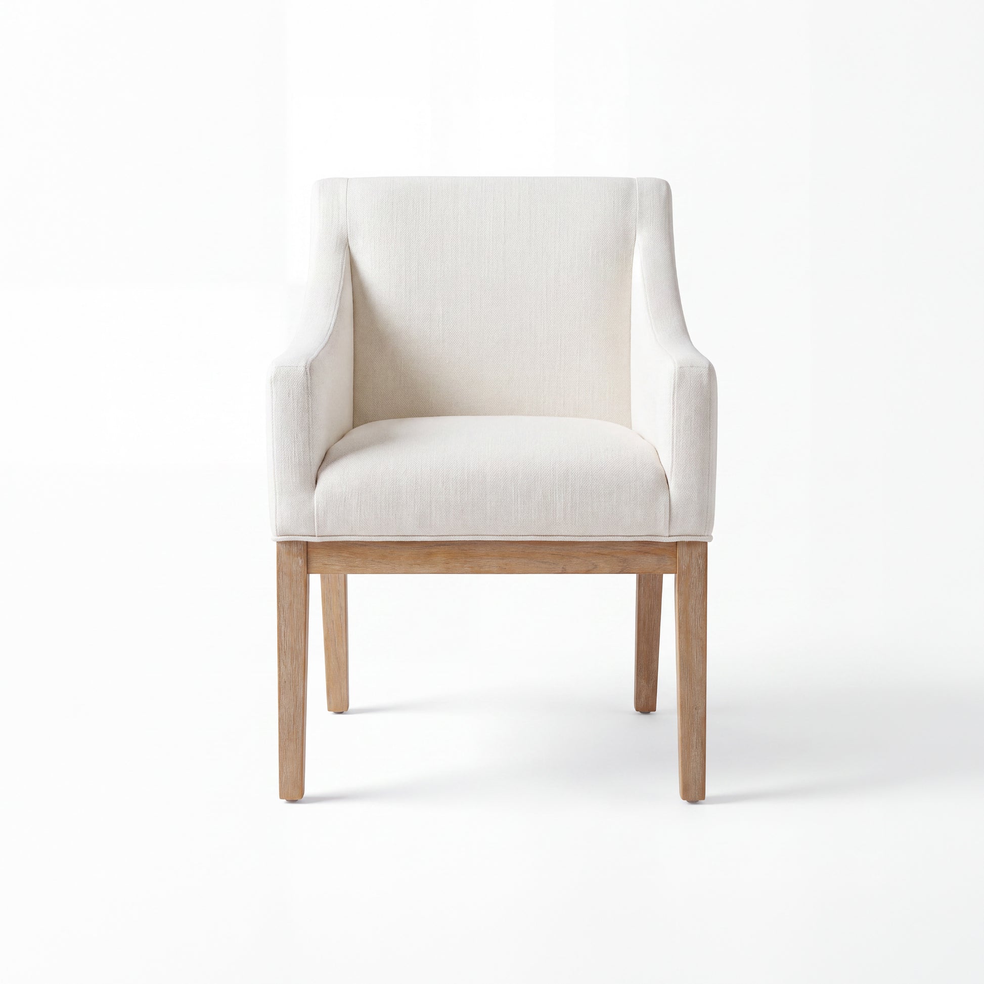 A modern accent chair with a light beige textured fabric upholstery and a natural light wood frame, shown against a clean white background.
