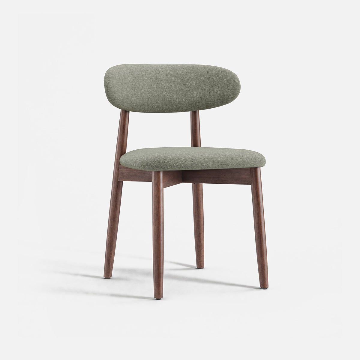COLAMY NOYA green mid-century modern dining chair with a curved upholstered back